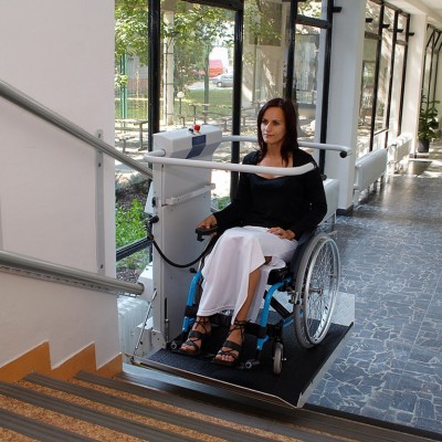 Side elevation lifting systems for wheelchairs